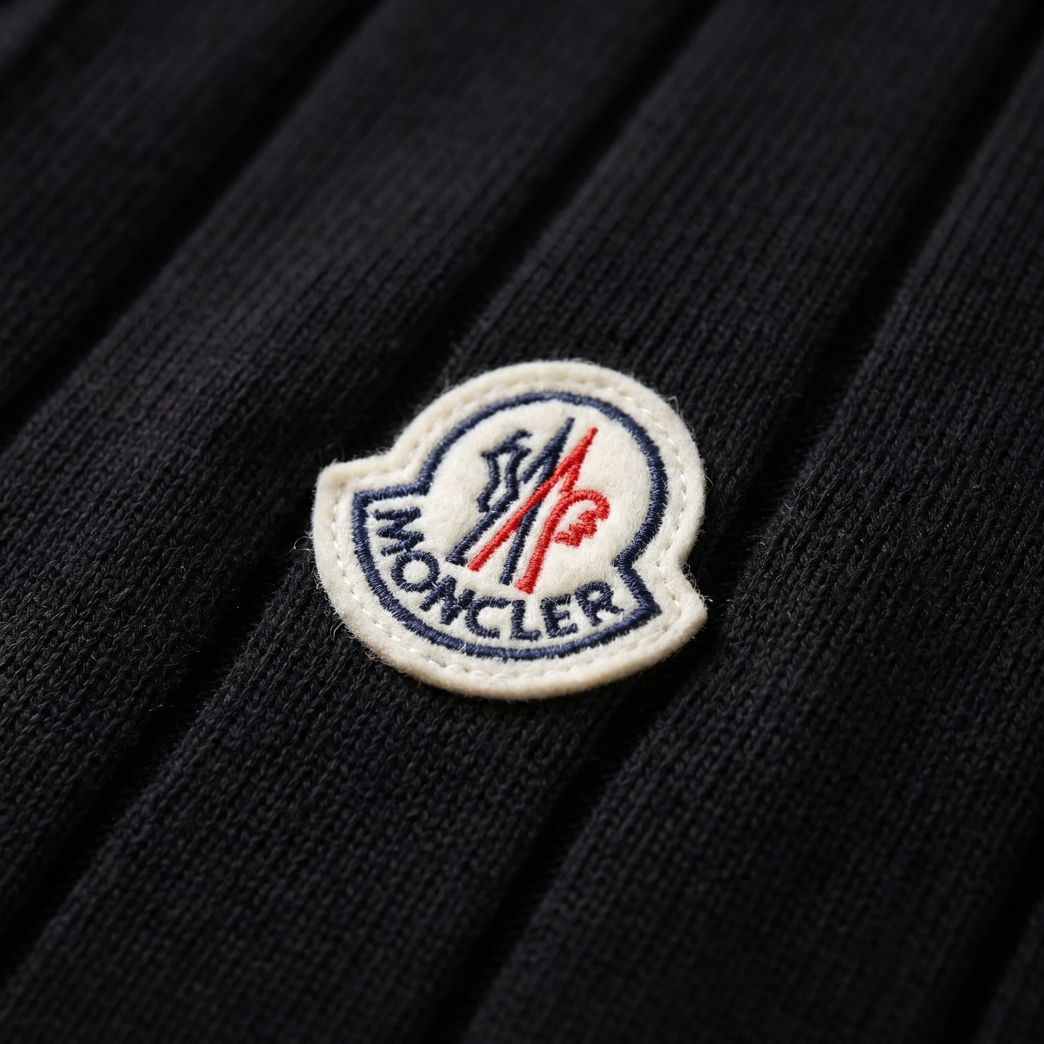 Moncler logo-plaque polo knitted shirt